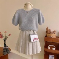 奶系少女温柔小蝴蝶结短袖毛衣女早春季甜美版型软糯针织小衫上衣