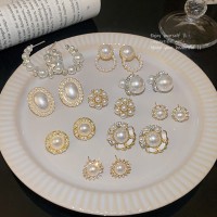 S925银针轻奢小众珍珠耳环女百搭气质猫眼石耳钉高级设计感耳饰品
