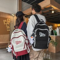 潮牌双肩包简约大容量男士背包休闲小学生初中生高中书包女生