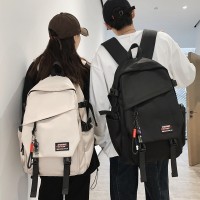 背包男款时尚简约潮流初中生轻便防水双肩包百搭高中生书包女