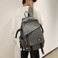 背包男款时尚简约潮流初中生轻便防水双肩包百搭高中生书包女