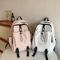 时尚简约小众书包高颜值纯色小学生背包女日系轻便初中生双肩包男