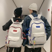 背包男款时尚轻便高中生韩版百搭双肩包撞色初中女生书包